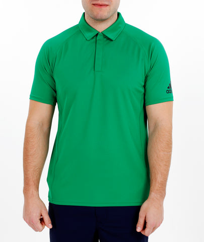 Man wearing green Adidas recycled bermuda polo